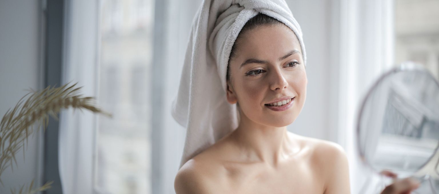 Client relaxing after a facial treatment