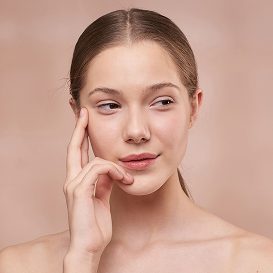 Woman with smooth, glowing skin for the Rejuvenation treatment menu
