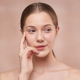 Woman with smooth, glowing skin for the Rejuvenation treatment menu