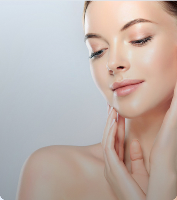 Woman touching her smooth, refreshed skin after a chemical peel